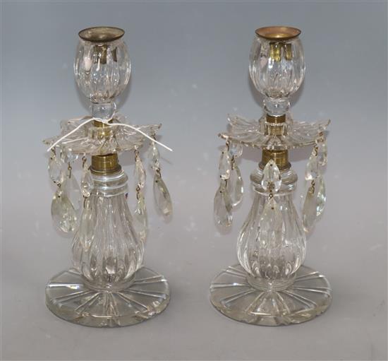 A pair of 19th century glass candlesticks with lustre drops